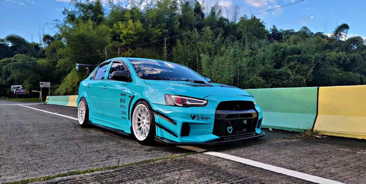 2010–2015 Mitsubishi Lancer Evolution X VARIS V2 Style Front Bumper – Unpainted FRP Material with Aggressive Aero Ducts and Splitter Design