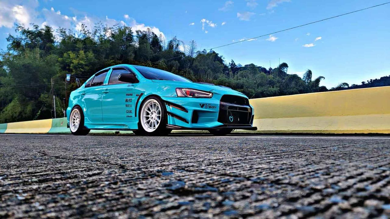 2010–2015 Mitsubishi Lancer Evolution X VARIS V2 Style Front Bumper – Unpainted FRP Material with Aggressive Aero Ducts and Splitter Design
