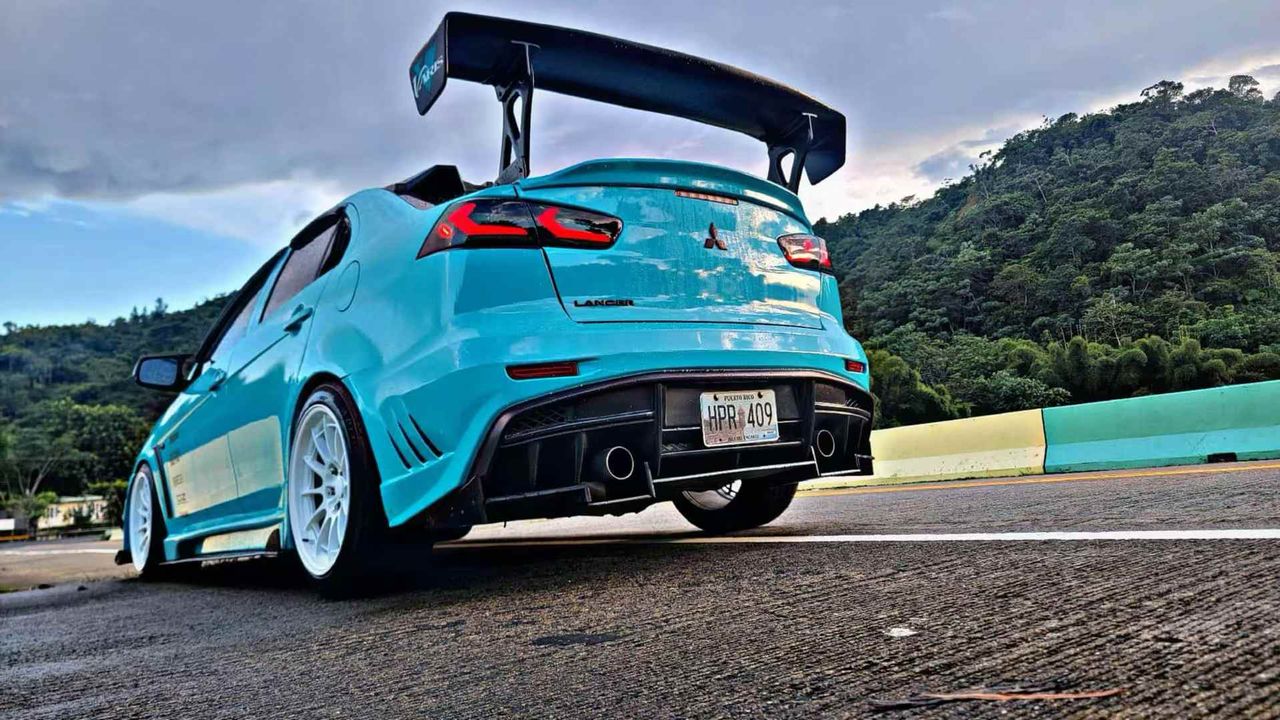 2010-2015 Mitsubishi Lancer Evolution X VARIS V2 Style Rear Bumper – Unpainted FRP Material with Aggressive Diffuser Styling