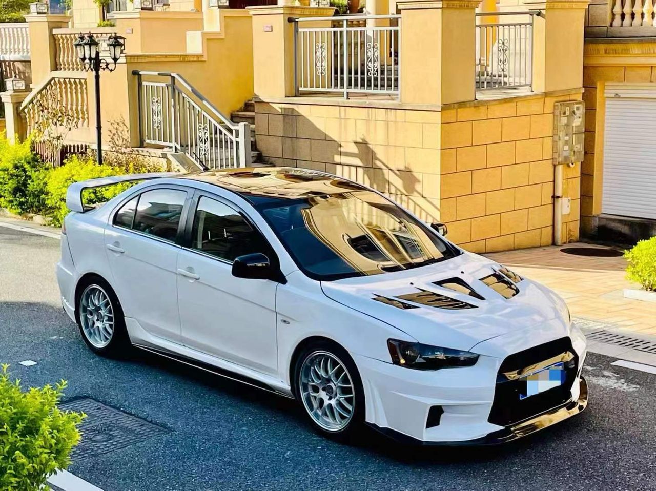 2010–2015 Mitsubishi Lancer Evolution X VARIS V2 Style Front Bumper – Unpainted FRP Material with Aggressive Aero Ducts and Splitter Design
