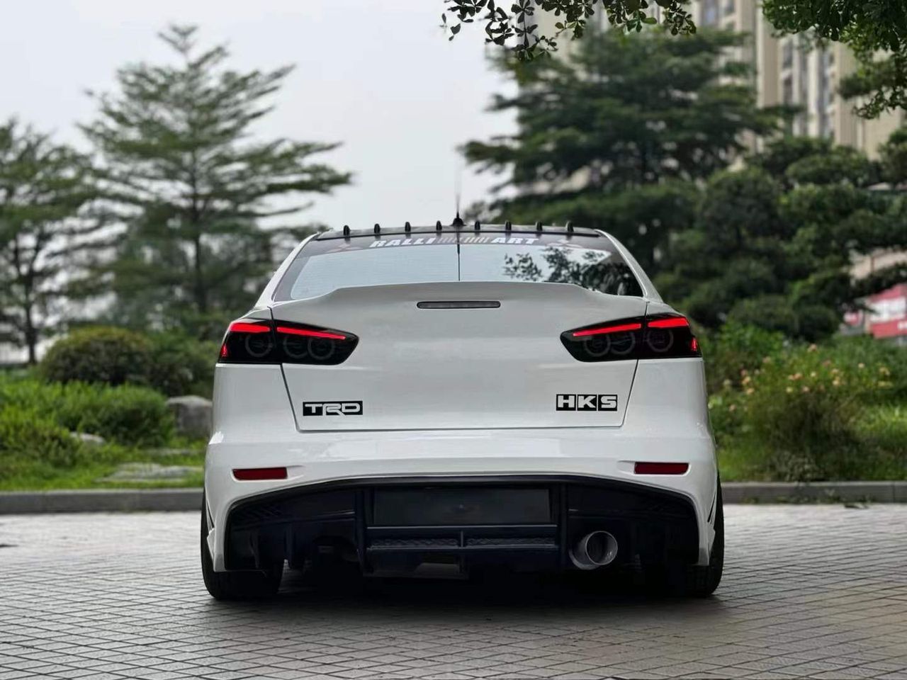 2010-2015 Mitsubishi Lancer Evolution X VARIS V2 Style Rear Bumper – Unpainted FRP Material with Aggressive Diffuser Styling