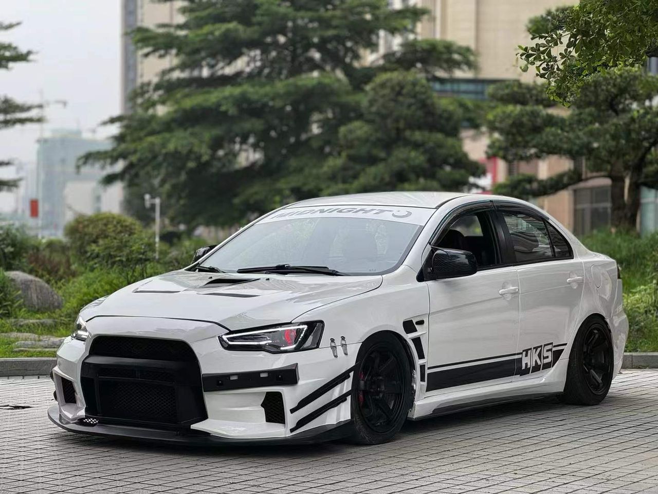 2010–2015 Mitsubishi Lancer Evolution X VARIS V2 Style Front Bumper – Unpainted FRP Material with Aggressive Aero Ducts and Splitter Design
